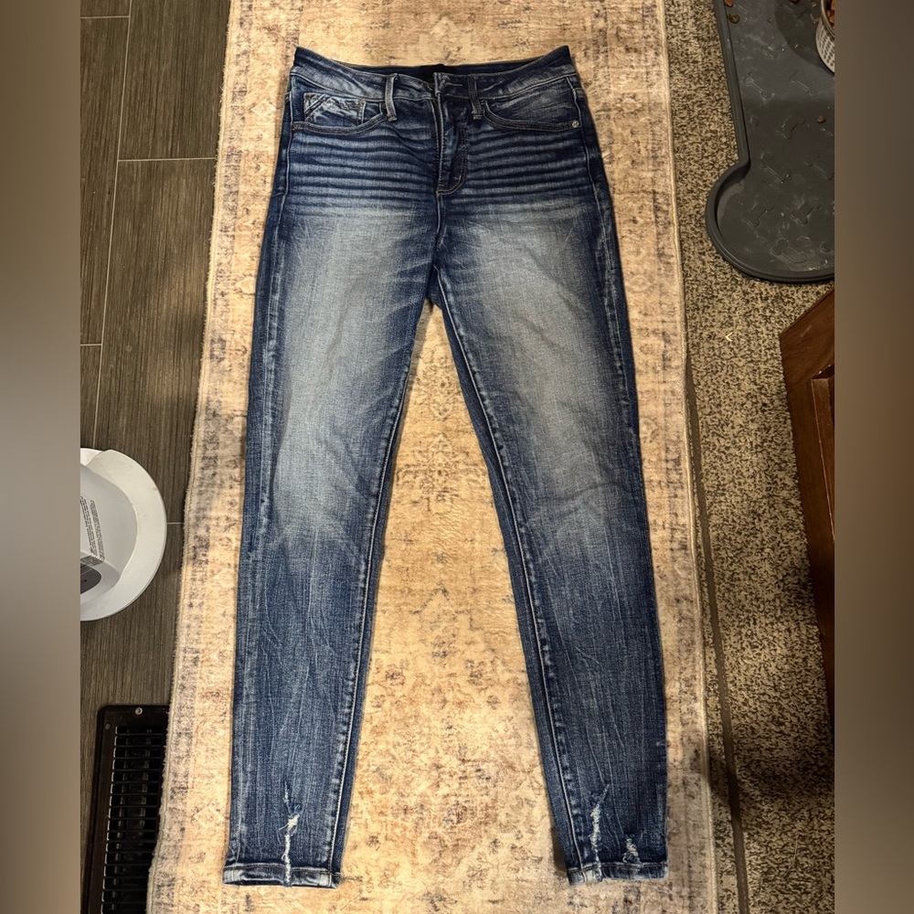 Buckle black skinny jeans